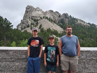My Husband and Boys at Mount Rushmore - Summer 2019