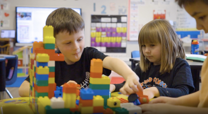 Children playing with colorful blocks